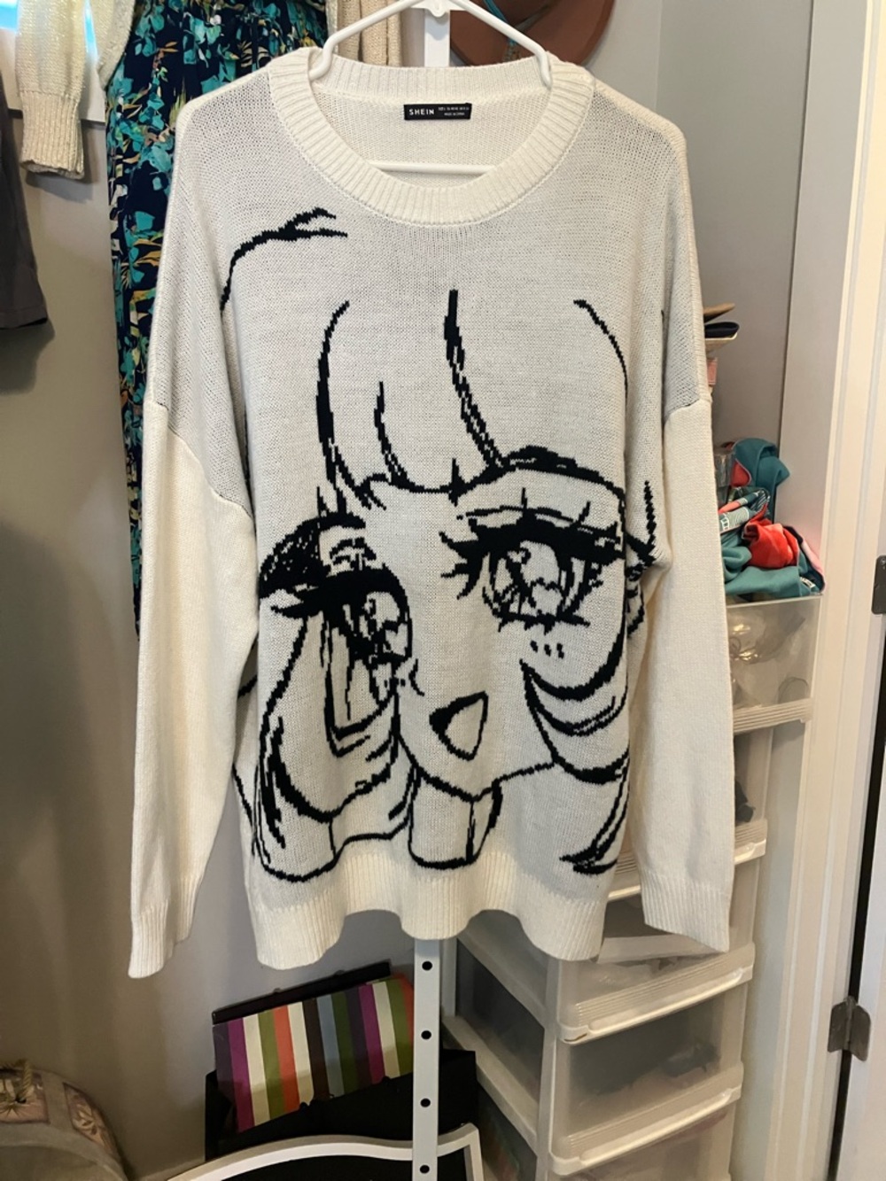 SHEIN White Sweater with Black Anime Face Graphic